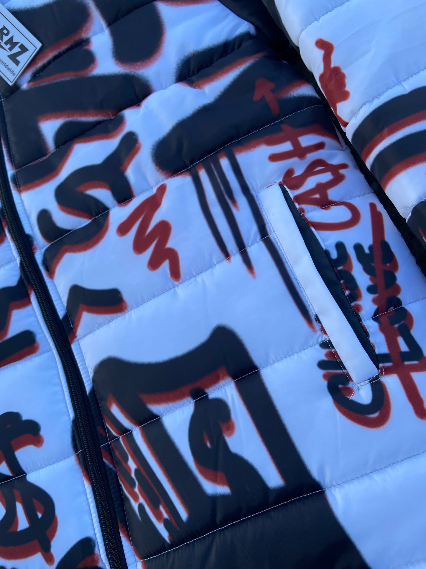 “Luck Is Not Real" White Graffiti Puffer Jacket