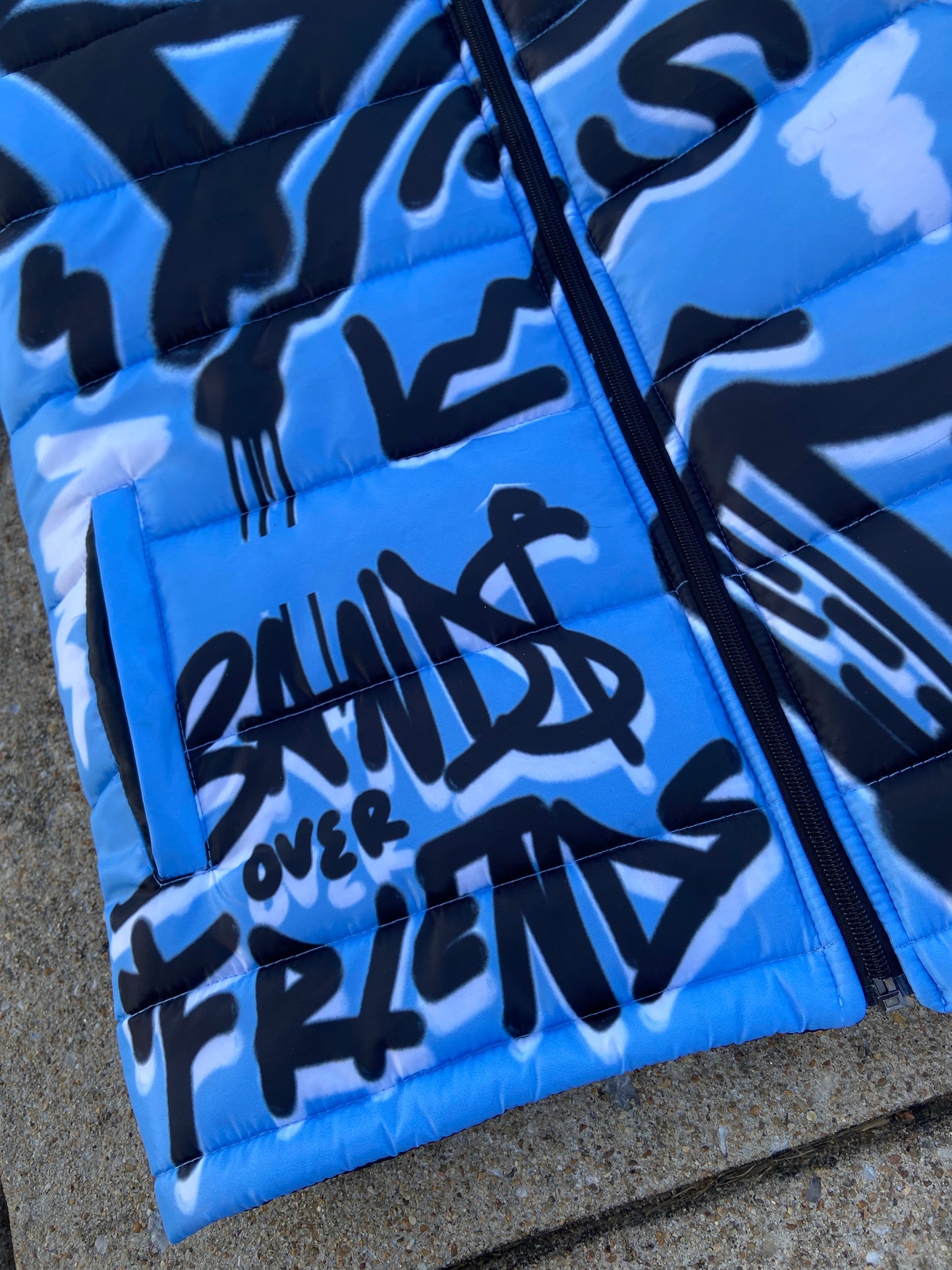 “Luck Is Not Real" Baby Blue Graffiti Puffer Jacket