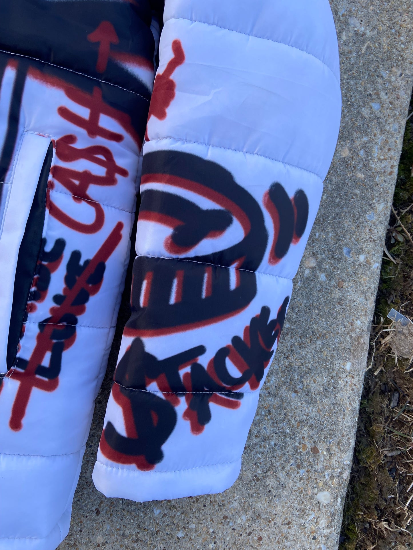 “Luck Is Not Real" White Graffiti Puffer Jacket