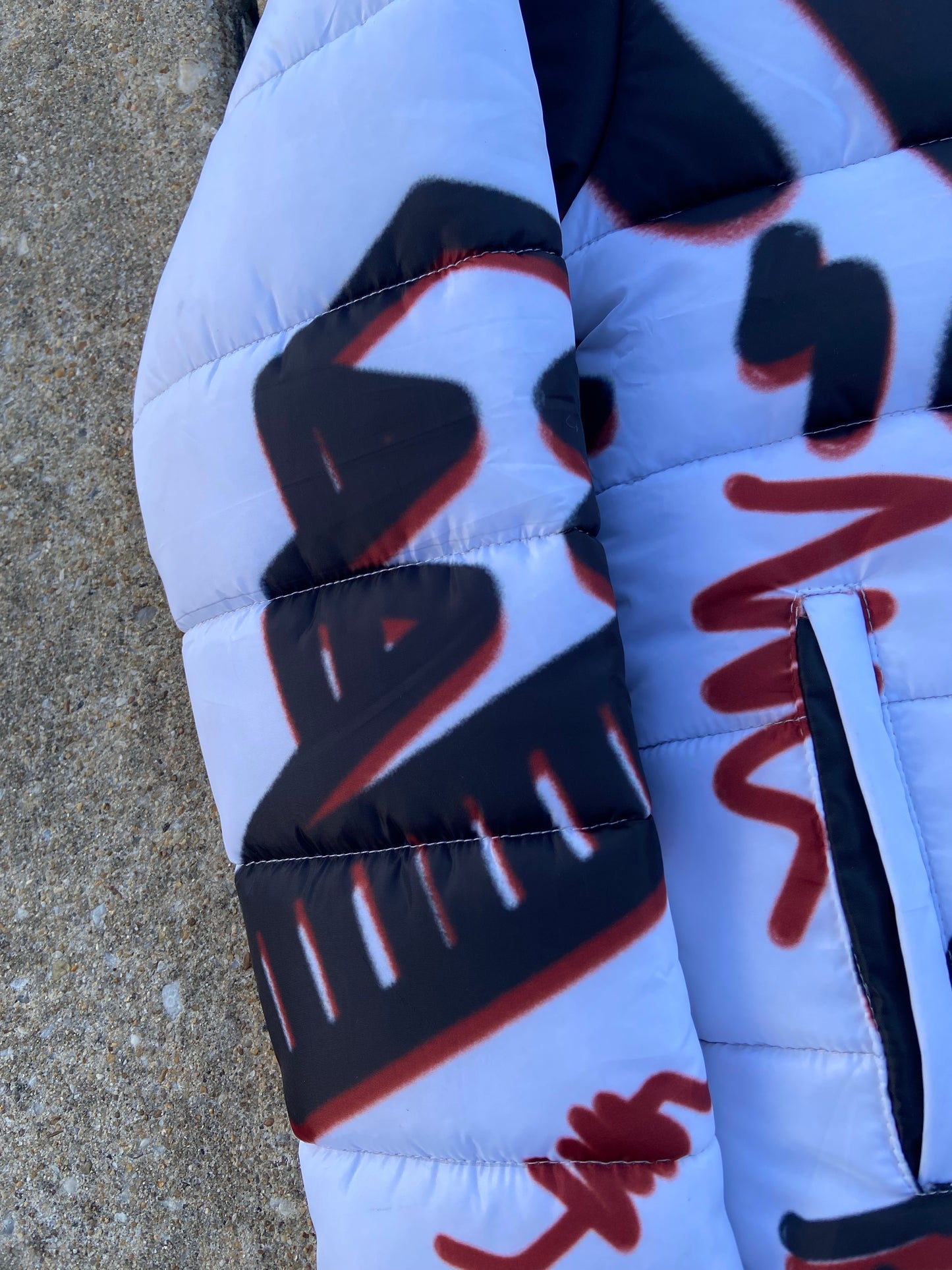 “Luck Is Not Real" White Graffiti Puffer Jacket