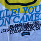 “Smile You’re On Camera” Heavyweight Tee