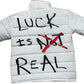 “Luck Is Not Real" White Graffiti Puffer Jacket