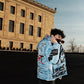 “Luck Is Not Real" Baby Blue Graffiti Puffer Jacket